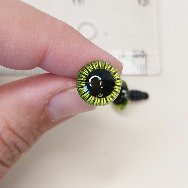 ojo de seguridad con destellos brillantes color verde de 11mm